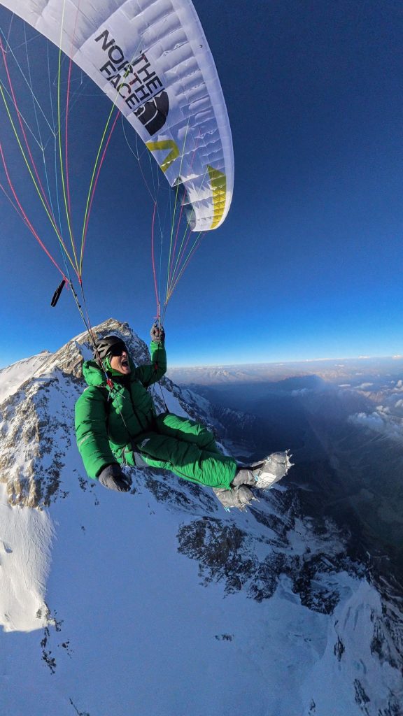 David Göttler paragliding down to base camp on June 24 after summiting Nanga Parbat (8125m). [Photo] Courtesy David Göttler