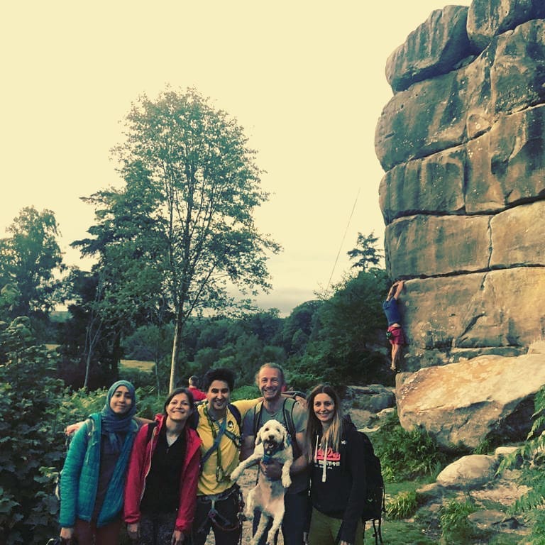 Participants enjoying an introductory outdoor rock climbing course at Harrison's Rocks.